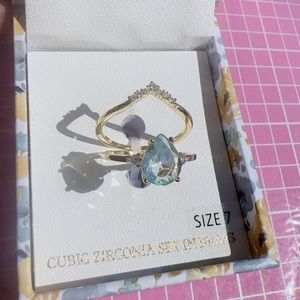 Audrey J gold tone ring set 2pc water blue diamond & white diamonds paved size 7